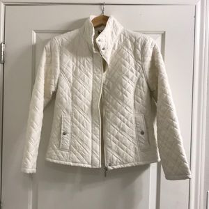 Short lightweight jacket . Light ivory